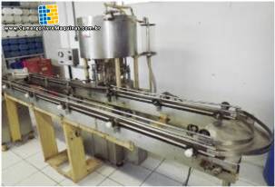 Envasadora rotativa com 12 bicos � vacuo Wada