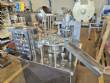 Envasadora dosadora rotativa semi-autom�tica para potes com tampa em alum�nio NTI